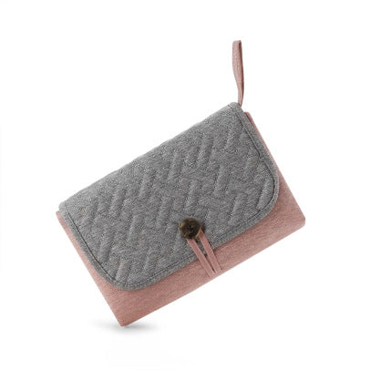 Tapis à langer nomade plié, coloris rose